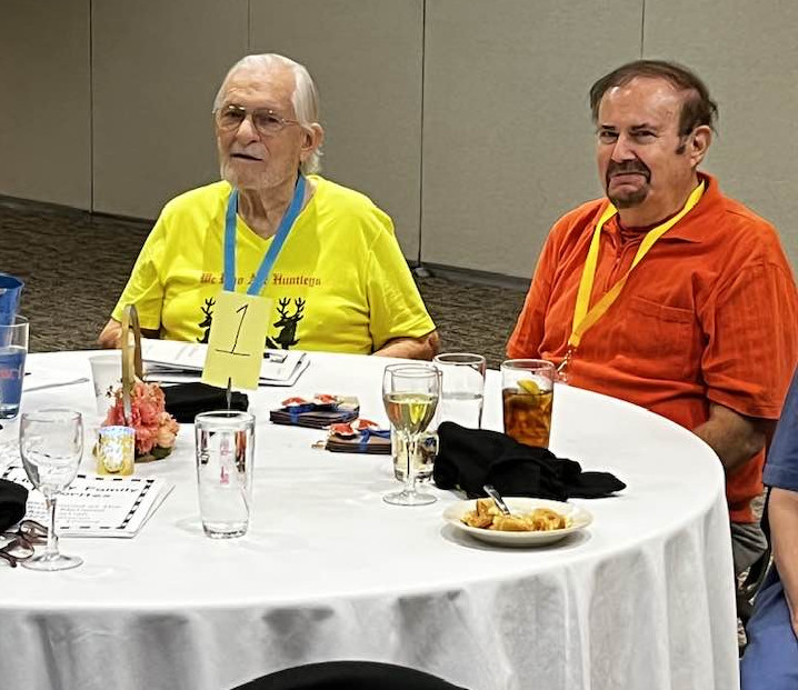 Two gentlemen at a table